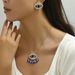 Instagram versatile hip-hop style women's earring necklace set with personalized devil's eye diamond design earrings and_ipsvogv.com