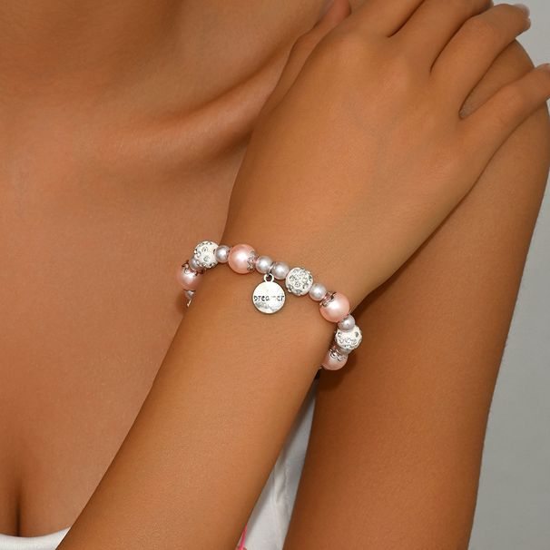 Ins Japanese and Korean small fragrance pink pearl English letters, niche design, set with diamonds, versatile bracelet_ipsvogv.com