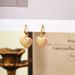 French heart-shaped pink drop glazed earrings, fashionable socialites, high-end feel, light luxury, versatile, niche_ipsvogv.com