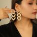 Statement Exaggerated Minimalist Style Gold Long Heart Earrings Niche Design Sense Flower Studs_ipsvogv.com
