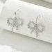 1 Pair Simple Style Bow Knot Inlay Copper Zircon Ear Studs_ipsvogv.com