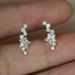 Cao Shi's earrings are copper plated with gold, shining with curved stars, versatile women's earrings_ipsvogv.com