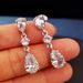 Cao Shi Sells Exquisite Women's Water Droplet Large Zircon With Sparkling Silver Plated Earrings_ipsvogv.com