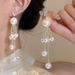 Unisex Tassel Long Pearl Earrings Ins Light Luxury Niche Design High End Exaggerated Earrings Hot Ear Jewelry_ipsvogv.com