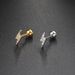 Unisex personality angel eye ear bone studs female geometric lightning screw buckle ear studs foreign trade piercing zircon earrings_ipsvogv.com