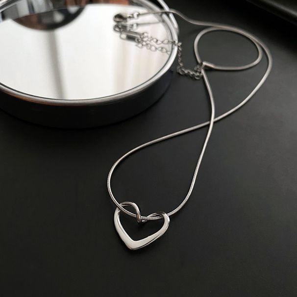 Titanium Steel Colorless Hollow Heart Necklace for Women's Light Luxury and Popular Design Sense Love Pendant Versatile_ipsvogv.com