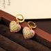 French heart-shaped pink drop glazed earrings, fashionable socialites, high-end feel, light luxury, versatile, niche_ipsvogv.com