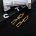 Subtle metal with cold cool style, featuring a minimalist design and exaggerated titanium steel long earrings_ipsvogv.com
