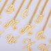 new A Z heart shaped hollow English letter necklace female creative stainless steel love pendant necklace_ipsvogv.com
