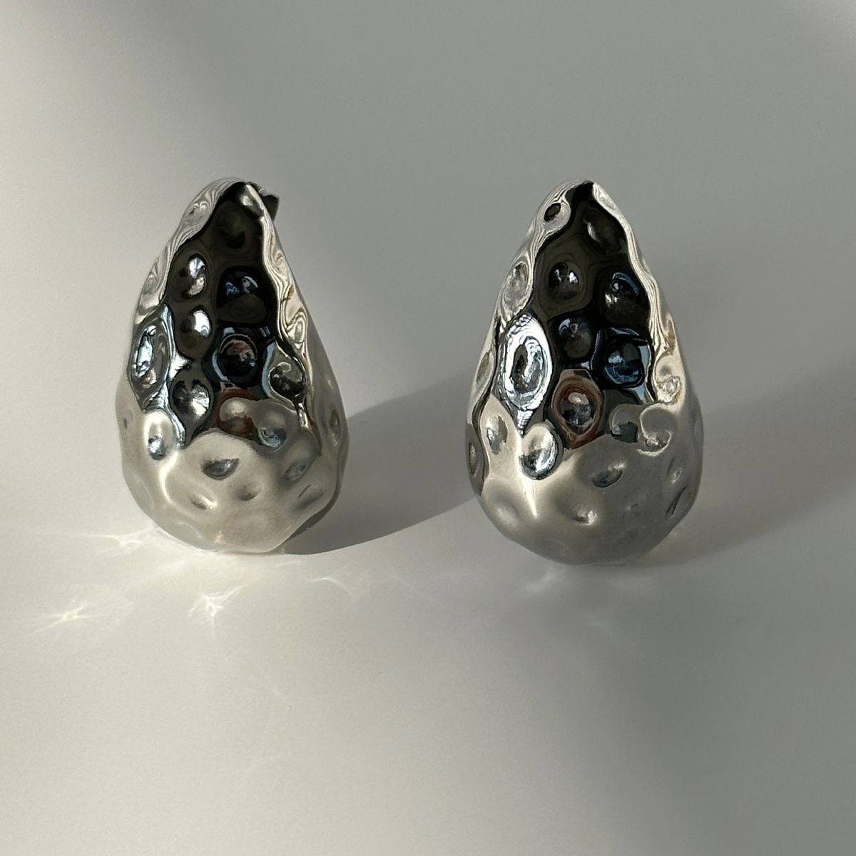 Spot Factory INS INS Retro Titanium Steel Simple Versatile Hammer Surface Water Drop Hollow Earrings_ipsvogv.com