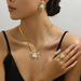 version of Korean style fresh and sweet women's earring necklace set, personalized flower exaggerated design, index_ipsvogv.com