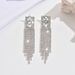 Unisex Hot Selling Personalized Full Diamond Water Drop Tassel Earrings Girls Nightclub Style Super Flash Water Diamond Earrings_ipsvogv.com