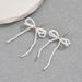 Fashion OL Bow Personalized Double layer Hollow Pearl Earrings Female Versatile Design Ear Bone Nails_ipsvogv.com