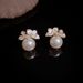 S Silver Needle Light Luxury Elegant White Lacquer Flower Pearl For Women Niche Fashion Design Versatile Earrings_ipsvogv.com