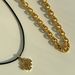 Spot INS Gold Plated Titanium Steel Retro Cross Black Leather Rope Necklace_ipsvogv.com