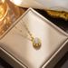 INS Cool Wind Love Spinning Set Zircon Pendant Necklace for Women with High Grade Sense, Light Luxury, and Small Design_ipsvogv.com