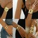 Light luxury style women's wristband with personalized inlaid pearls adjustable opening, featuring a niche flower design_ipsvogv.com