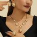 Statement Jewelry Set: Exaggerated High-End Glossy Heart Necklace, Ring, And Round Earrings_ipsvogv.com