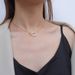 Pearl Double Ring Titanium Steel Necklace With Female Niche Design That Exudes A Sense Of Luxury And Temperament._ipsvogv.com