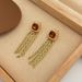 Small French style exaggerated earrings temperament geometric tassel long earrings ancient stroke light luxury earrings_ipsvogv.com