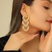 Statement Exaggerated Minimalist Style Gold Long Heart Earrings Niche Design Sense Flower Studs_ipsvogv.com