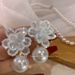 Unisex Summer Light Luxury Fresh Hand Woven Pearl Crystal Flower Earrings Ins Style Super Fairy Versatile Earrings_ipsvogv.com