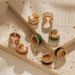 Ear clips inlaid with zircon four color temperament ear bone clips without ear holes copper plated K real gold C shaped light luxury style earrings_ipsvogv.com