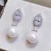 water drop shaped earrings is versatile and imitates pearl earrings. Female celebrities wear the same light _ipsvogv.com