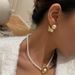 Fashionable Ins Plated Titanium Steel Retro Flower Stamen Pearl Small Earrings_ipsvogv.com