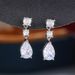 Cao Shi's Small Fresh Classic Droplet Earrings with Light Micro Pear Shaped Zircon Bridal Style Earrings for Women_ipsvogv.com