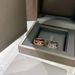 Three diamond sliding ring with rose gold and diamond inlay, personalized hollow and dynamic for men and women_ipsvogv.com