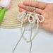 Unisex Exaggerated Pearl Bow Chain Tassel Earrings New Style Unique Personality Earrings Light Luxury Exquisite_ipsvogv.com