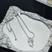 Autumn New Korean Silver-Plated Matte Silver Ribbon Bowknot Dynamic Pearl Necklace Sweater Chain For Women With High-End_ipsvogv.com