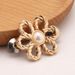 Metal hollow flower waist buckle no nail pants to make the waist smaller artifact skirt waist button_ipsvogv.com