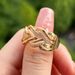 Cao Shi's Multi-layer Winding Creative Hollow Metal Geometric Fried Dough Twists Ring For Men And Women_ipsvogv.com