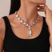 Light luxury style diamond-encrusted water drop square necklace exaggerated niche temperament high-grade collarbone necklace_ipsvogv.com