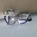 Cao Shi's Advanced Sense Treasure Blue Zircon Earrings with Korean Version Temperament and Personality Cross Hip Hop Style Earrings_ipsvogv.com