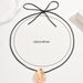 Ms. Feng's conch with niche high-end design, featuring a metal style long collarbone necklace and neck accessory_ipsvogv.com