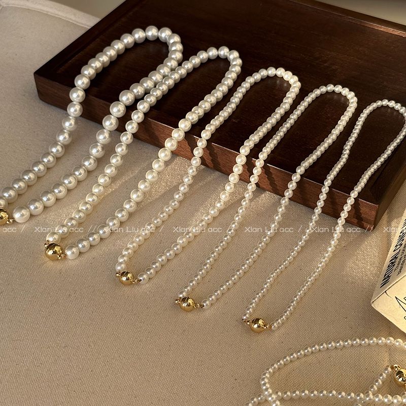 Light Luxury Strong Light Shijia Pearl Necklace 2024 New Magnetic Buckle Collarbone Women's Autumn And Winter Sweater_ipsvogv.com