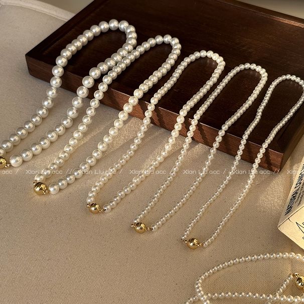 Light Luxury Strong Light Shijia Pearl Necklace 2024 New Magnetic Buckle Collarbone Women's Autumn And Winter Sweater_ipsvogv.com