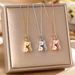 Korean Version Titanium Steel Necklace For Women, Niche, Micro Inlaid, High-end Pearl Peanut Pendant, Light Luxury_ipsvogv.com