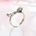Women's Jewelry Elegant Bow Ring With Zircon Stones, Silver-Toned Copper Alloy Statement Ring For Valentine's Day, Birthday Gift, Fashion Accessory_ipsvogv.com