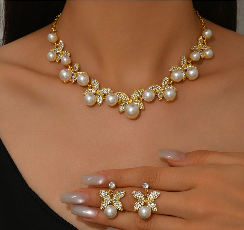 2025 New Hollow Leaf Necklace Earrings Bracelet Ring Four-Piece Set Bridal Wedding Rhinestone Accessories_ipsvogv.com