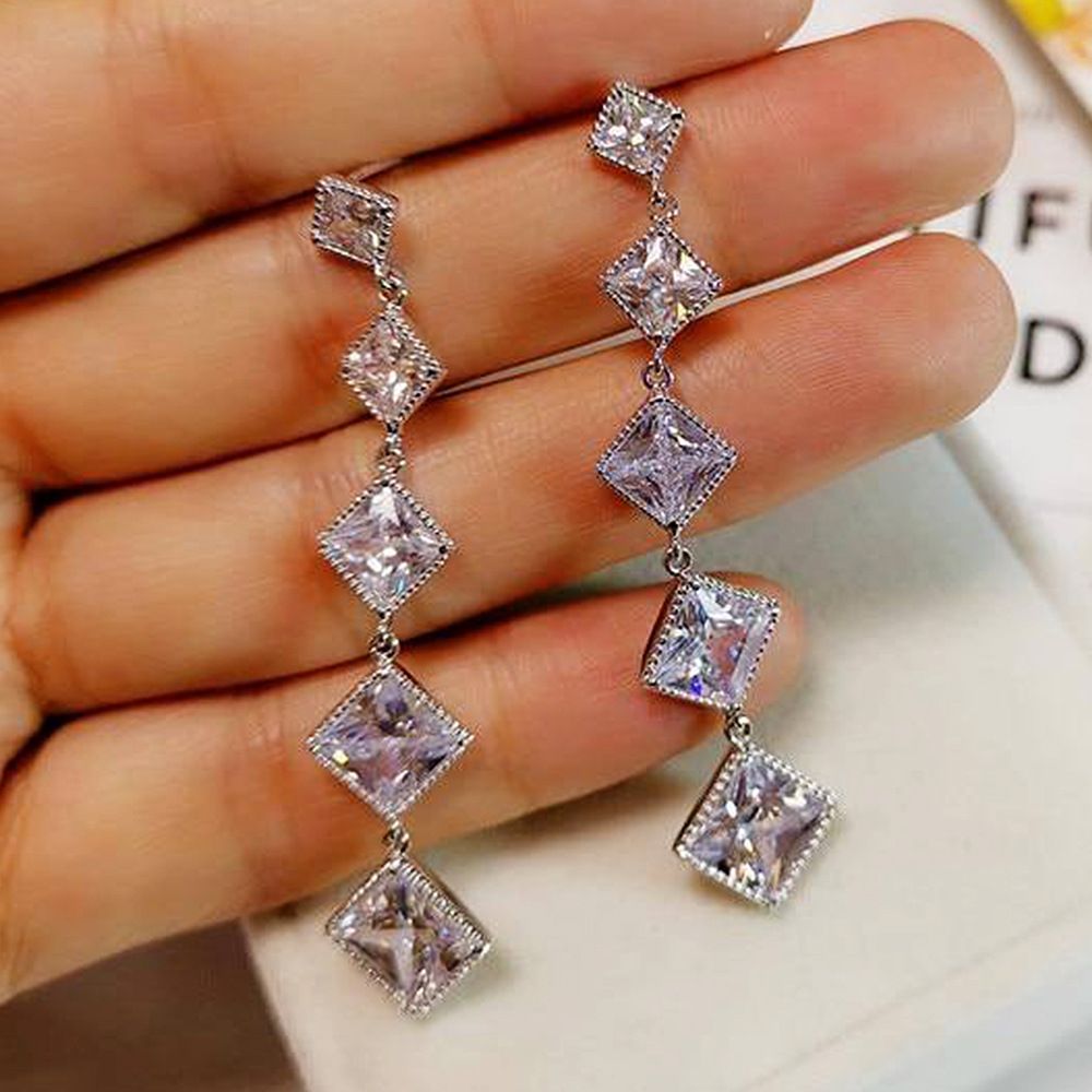 Cao Shi's square tassel long earrings, female face trimming, slimming, and versatile ear accessories_ipsvogv.com