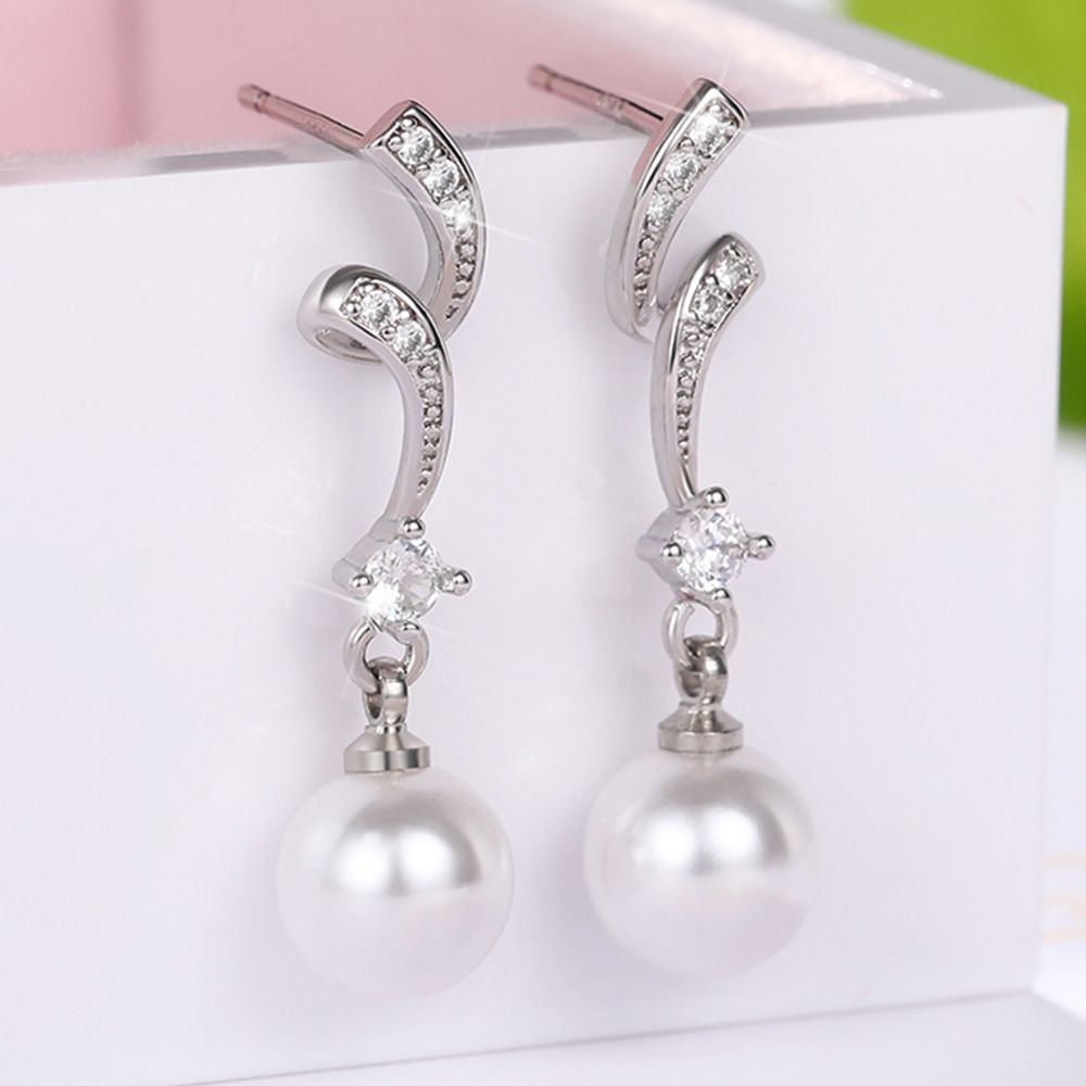 Cao Shi Synthetic Mother Shell Pearl Earrings Elegant and Exquisite Wave Pattern Earrings for Women's Long and Simple Earrings_ipsvogv.com