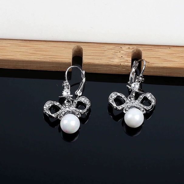 Empress Dowager Xi, full of diamonds, bow and pearl patchwork, Saturn earrings, light luxury, high-end sense,_ipsvogv.com