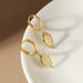 Earrings sterling silver flashing leaf ear buckle light luxury autumn and winter niche ins style earrings women's high-end jewelry_ipsvogv.com