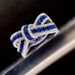 Cao Shi's High End Korean Edition Bow Ribbon Irregular Cross Light Luxury Fashion Ring_ipsvogv.com