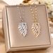 Titanium Steel Necklace, Female Copper Inlaid Zircon Pendant, Feather Leaf, Collarbone Chain, Love Wing Accessory_ipsvogv.com