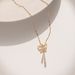 Cat's Eye Bow Tassel Titanium Steel Necklace High end Light Luxury Micro Zirconium Embedding 2023 Summer New Style with_ipsvogv.com